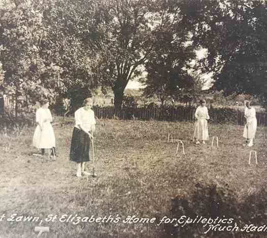 Playing Croquet on the Lawn - 1908